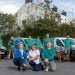 people in front of dog vans