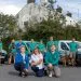 people in front of dog vans