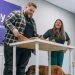 man performing dog first aid