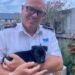 an RSPCA officer holding a puppy